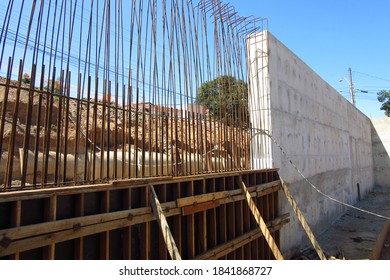 Reinforced concrete retaining wall construction - Shutterstock ID 1841868727