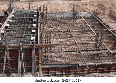 Reinforcement bar tying work for structural elements in a petrochemical facility.