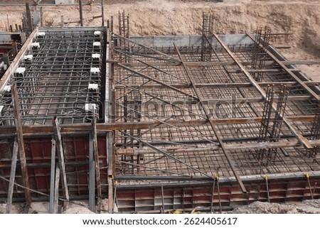 Reinforcement bar tying work for structural elements in a petrochemical facility.