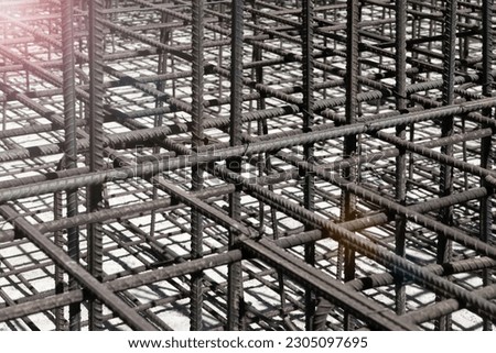 Reinforcement steel rod and deformed bar with rebar at construction site Steel bar or steel reinforcement bar. Construction armature. Reinforcements iron bars in row.