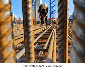 Reinforcement Work in Progress: Showcasing Structural Integrity and Workforce Excellence on Construction Site.