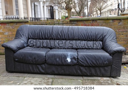 Rejected Old Sofa Waiting For Furniture Collection