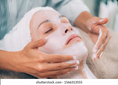 Rejuvenating facial mask and lifting massage.