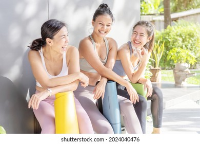 Relationship Asian generation woman diverse friendship and LGBT healthy in group class exercise yoga at gym. Cheerful lady discuss talk together with happy smile and laugh at shade outdoor green tree. - Powered by Shutterstock