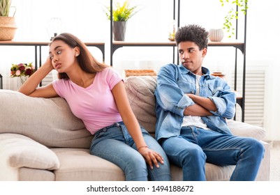 Relationship Problem. Black Teen Couple Ignoring Each Other After Argument At Home