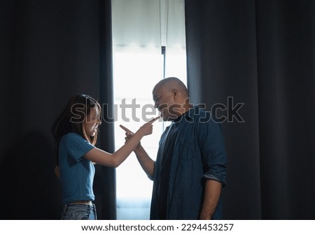 Relationships problems conflicts in marriage. Depressed stressed violence young couple man and woman Argument fighting shouting in the house. Making decision of breaking up get divorced. Harassment