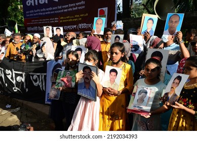 Relatives Hold Portraits Of Their Missing Family Members During Protest Rally Demanding Return Victims Of Enforced Disappearance By Security Forces In Dhaka, Bangladesh, On August 20, 2022