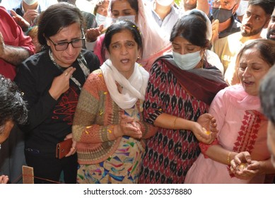 Relatives And Neighbours Mourn Near The Body Of Kashmiri Pandit Makhan Lal Bindroo, During His Funeral In Srinagar, The Summer Capital Of Indian Kashmir, On Wednesday 06 October 2021.