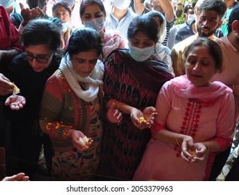 Relatives Pray And Mourn Near The Body Of Kashmiri Pandit Makhan Lal Bindroo, During His Funeral In Srinagar, The Summer Capital Of Indian Kashmir, On Wednesday 06 October 2021.