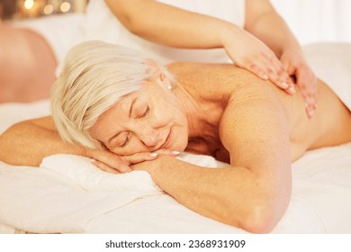 Relax, back massage and senior woman sleeping at a spa for health, wellness and skincare treatment. Calm, beauty and closeup of elderly female person with body self care routine at a natural salon. - Powered by Shutterstock