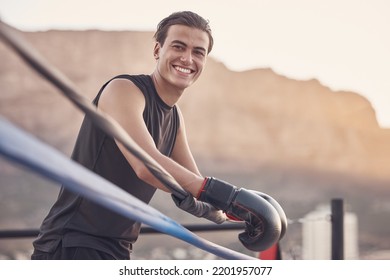 Relax, Boxing Ring And Portrait Of Man With Gloves On Break In Outdoor Gym For Martial Arts Class. Fitness, Wellness And Kickboxing Person Taking Rest In The Fresh Air While At Sports Training.