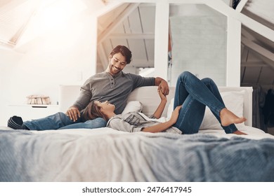 Relax, couple and holding hands in bed in the morning with love, bonding and care together in a home with a smile. Chat, marriage and romance of happy people in a bedroom with support and commitment - Powered by Shutterstock