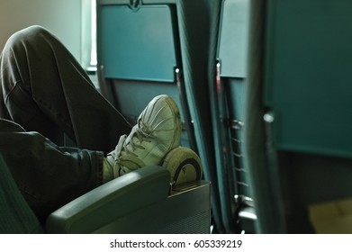 Relax Feet On A Bus Seat