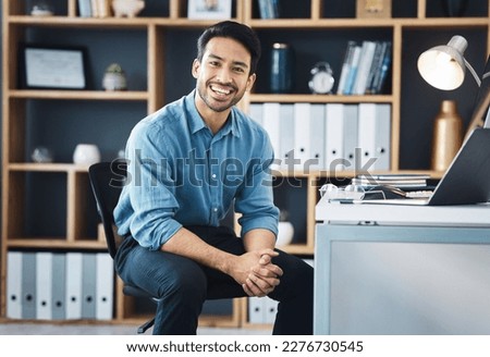 Relax, founder and portrait of entrepreneur smile and sitting in startup company office excited for the future. Young, happy and professional business man or worker feeling confident and proud