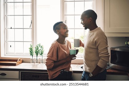 Relax, laughing and black couple drinking coffee with smile and love in house for love, talking and bonding. Beverage, break and happy African people in kitchen together to chill in lounge in Kenya - Powered by Shutterstock