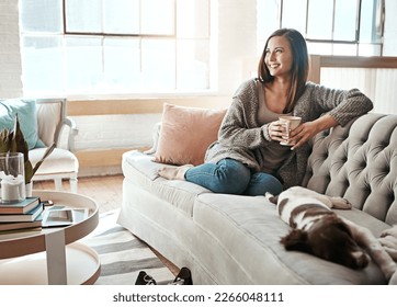 Relax, morning tea and woman with dog on a home living room couch feeling calm with happy lifestyle. Happiness and smile of person with puppy thinking with coffee on peaceful lounge day in a house - Powered by Shutterstock