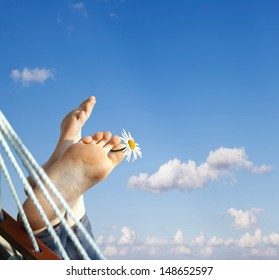 Relax In Nature. Feet Close Up In A Hammock