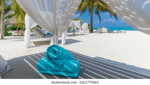 Relax on luxury VIP beach with white pavilions in sunny blue sky. Luxury vacation beach holiday in tropical resort, hotel. Couple retreat Fantastic leisure lifestyle landscape, palm trees white sand