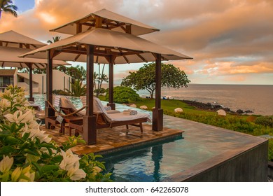 Relax On Vacation At The Pool Area And Which Overlooks The  Sunset In The Beach And Sea On A Maui Island  In Hawaii, USA.