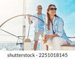 Relax, travel and luxury with couple on yacht for summer, love and sunset on Rome vacation trip. Adventure, journey and vip with man and woman sailing on boat for tropical honeymoon at sea