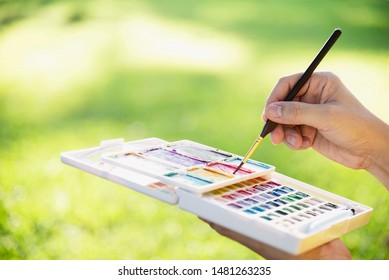 Relax Woman Painting Water Colour Art Work In Green Garden Forest Nature - People With Creative Art In Nature Stress Reduction And Meditation Concept 