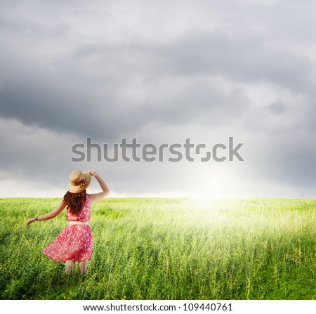 Image, Stock Photo girl walking in a field with yellow flowers sunny day