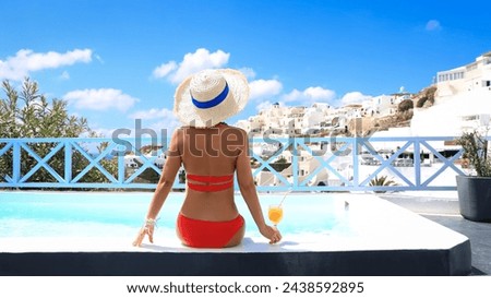 Relaxation mood with young woman in hat at happy freedom lifestyle in Aegean sea mediterranean at Santorini,greece	