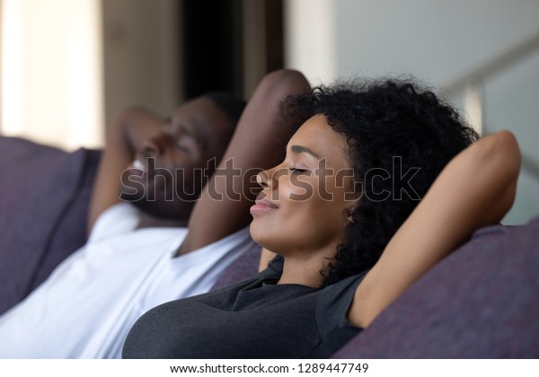 Relaxed African Couple Enjoying Peaceful Rest Stock Photo Edit