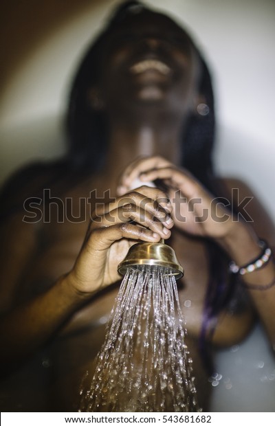 black girl taking shower