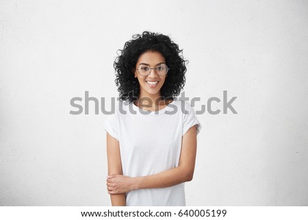 Similar – Image, Stock Photo Young woman in front of white wall smiles