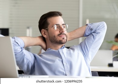 Relaxed Confident Business Man Taking Break From Work On Laptop For Mind Relief Holding Hands Behind Head Thinking Of Success Enjoying Rest, Good Result Of Job Done In Office, No Stress Free Concept