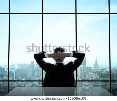 relaxed man sitting in office