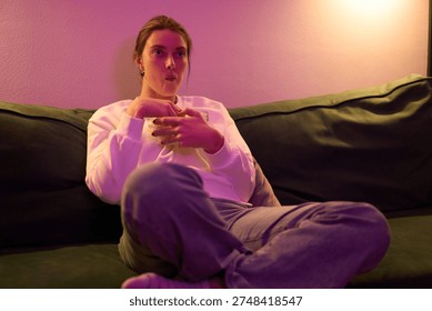 Relaxed Nighttime Snacking in Soft Colored Light