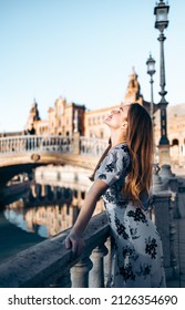 Relaxed Pretty Woman Enjoying The Sunlight Visiting Europe