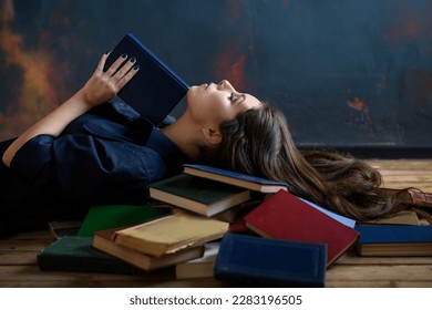 A relaxed woman underlie and reads in a room full of books. - Powered by Shutterstock