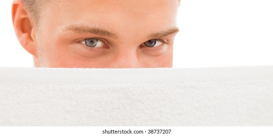 Relaxed Young Blond Handsome Man Hiding Behind White Towel