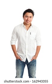 Relaxed Young Man In A White Shirt And Jeans. White Background.