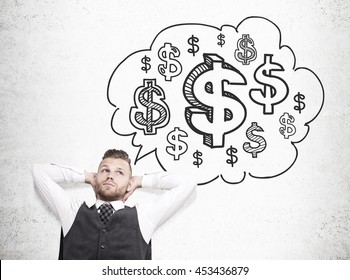 Relaxing Businessman Daydreaming About Money On Concrete Background With Dollar Sign Sketch Inside Thought Cloud. Financial Growth Concept