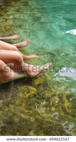 Relaxing feets in the water at Emerald Pond
