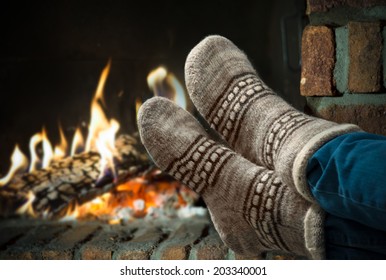 Relaxing at the fireplace on winter evening