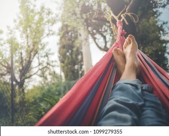 Relaxing In The Hammock, Nude Feet Close Up, Spring Day. Summer Holidays. Relax In Nature