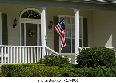 Relaxing Home With American Flag On Porch 03