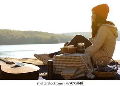 Relaxing moments , woman traveler hands holding a cup of coffee near the lake. Adventure, Travel, tourism and camping concept. - Shutterstock ID 789095848