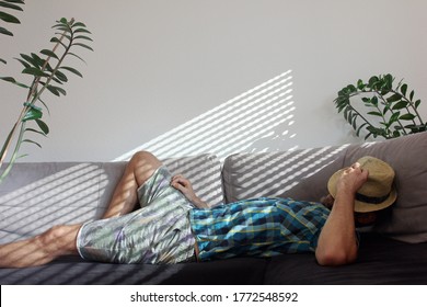 Relaxing on couch at home while summer heat - Powered by Shutterstock