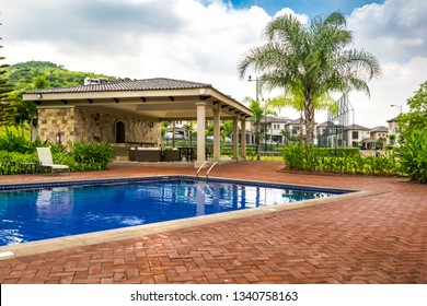 Relaxing Pool Area In A Gated Community. Sunny Day, No People.