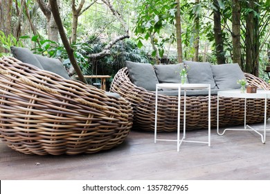 Relaxing Rattan Sofa In The Garden.