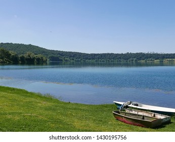 relaxing view of the calm Lake of Martignano, in Italy - Shutterstock ID 1430195756