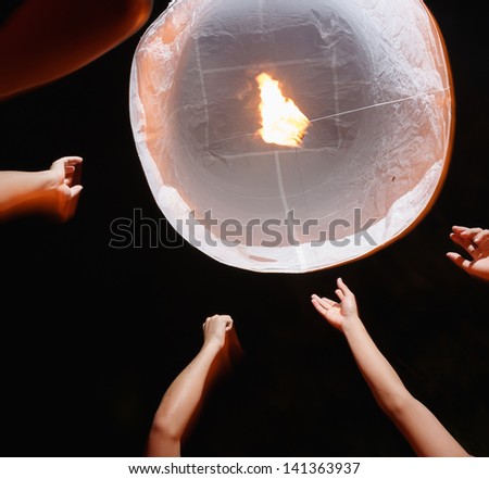 Releasing hot air lanterns  in Chiang mai north Thailand