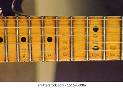 reliced fretboard