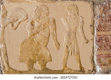 Relief from Dayr al Bahari temple showing Queen Eti of Punt with her husband Perehu as they welcome the delegation by sea of Queen Hatshepsut. 15th c. B.C. Luxor . Egypt.